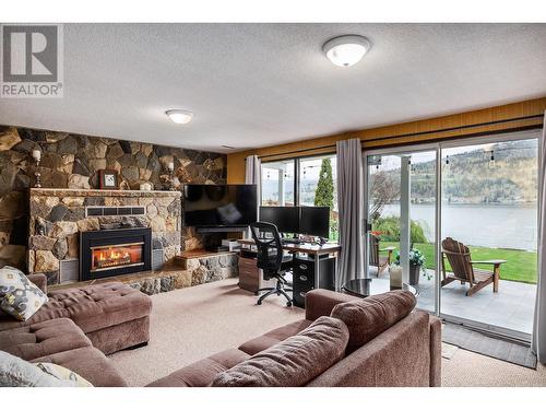 8291 Okanagan Landing Road, Vernon, BC - Indoor Photo Showing Living Room With Fireplace