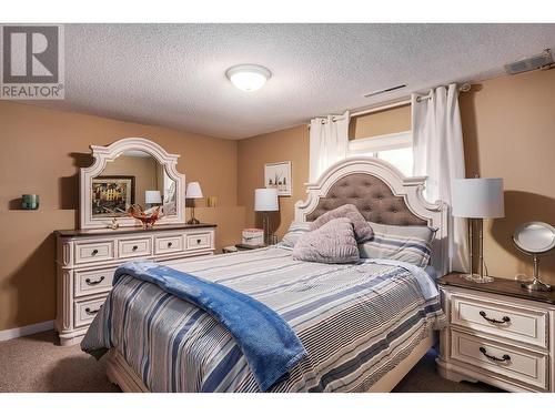 8291 Okanagan Landing Road, Vernon, BC - Indoor Photo Showing Bedroom