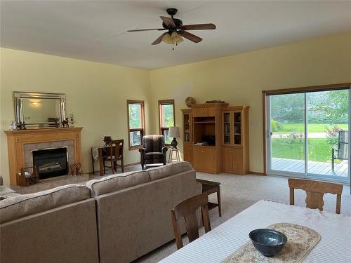 121 South Ditch Lake Co-Op Road, Ditch Lake, MB - Indoor Photo Showing Living Room With Fireplace