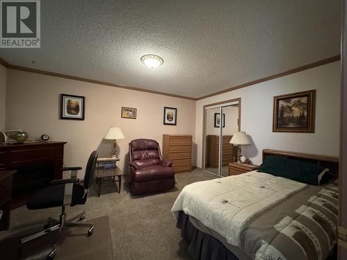 4062 Mckinley Drive, Lac La Hache, BC - Indoor Photo Showing Bedroom