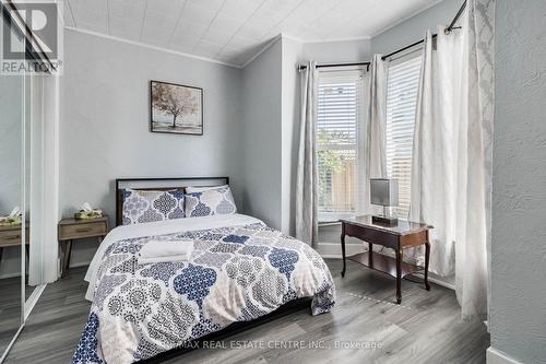 5057 -5063 Bridge Street, Niagara Falls, ON - Indoor Photo Showing Bedroom