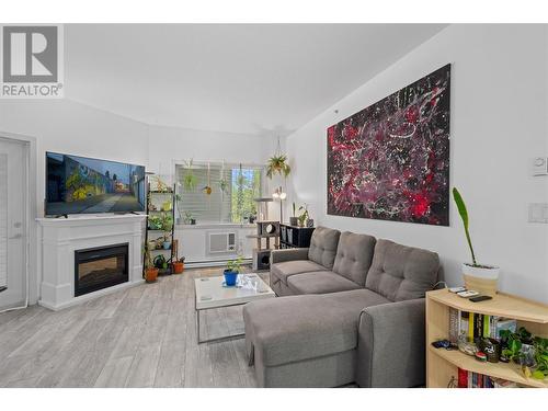 345 Mills Road Unit# 305, Kelowna, BC - Indoor Photo Showing Living Room With Fireplace