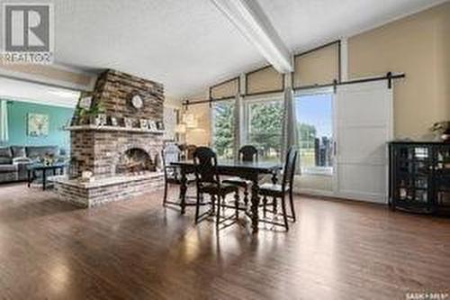 3762 Haliburton Avenue, Furdale, SK - Indoor Photo Showing Dining Room With Fireplace