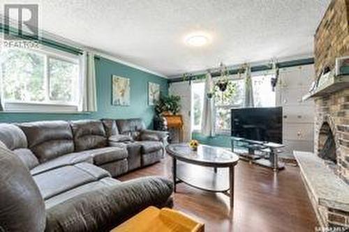 3762 Haliburton Avenue, Furdale, SK - Indoor Photo Showing Living Room With Fireplace