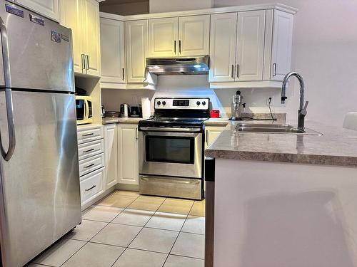 Kitchen - 001-7900 Rue St-Hubert, Montréal (Villeray/Saint-Michel/Parc-Extension), QC - Indoor Photo Showing Kitchen With Double Sink