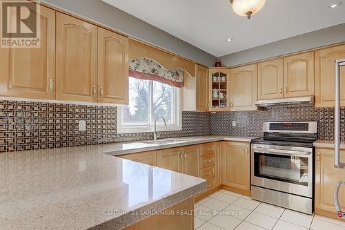 304 Goldhawk Trail, Toronto (Milliken), ON - Indoor Photo Showing Kitchen With Double Sink