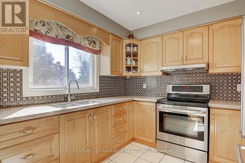 304 Goldhawk Trail, Toronto (Milliken), ON - Indoor Photo Showing Kitchen With Double Sink