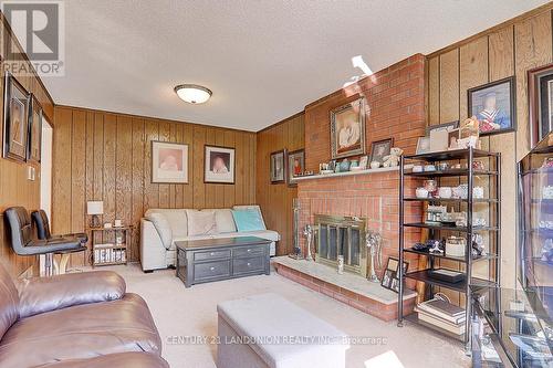 304 Goldhawk Trail, Toronto (Milliken), ON - Indoor Photo Showing Living Room With Fireplace