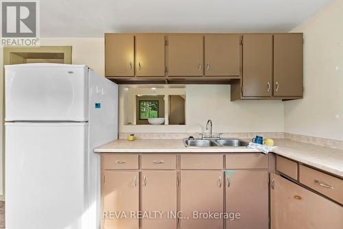 78 Bridge Street E, Bancroft, ON - Indoor Photo Showing Kitchen With Double Sink