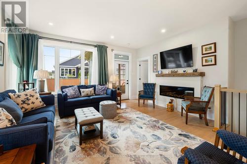 45 Shelter Cove Drive, Westport, ON - Indoor Photo Showing Living Room With Fireplace