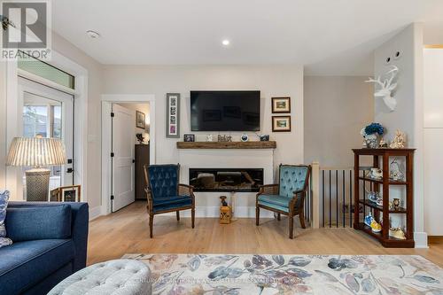 45 Shelter Cove Drive, Westport, ON - Indoor Photo Showing Living Room With Fireplace