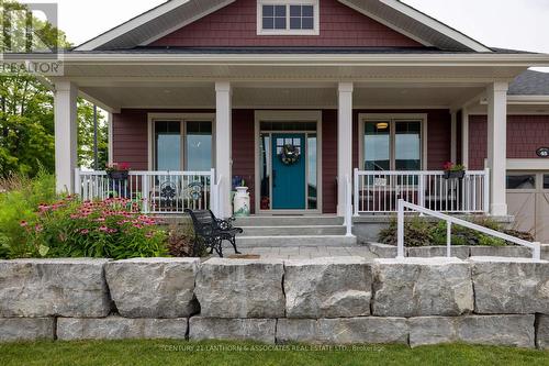 45 Shelter Cove Drive, Westport, ON - Outdoor With Deck Patio Veranda With Facade