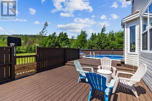 14 Western Island Pond Drive, Torbay, NL - Outdoor With Above Ground Pool With Deck Patio Veranda