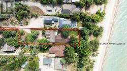 Approximate lot lines, lakefront on sandy and desirable Lurgan Beach. - 