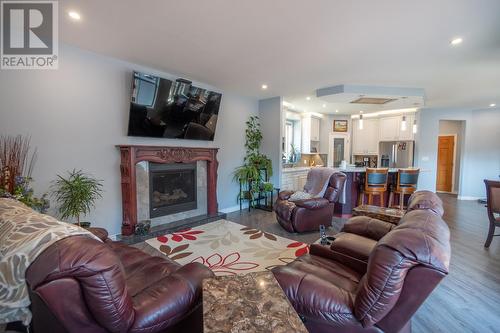 2977 Upper Levels  Road, Castlegar, BC - Indoor Photo Showing Living Room With Fireplace