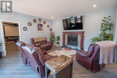 2977 Upper Levels  Road, Castlegar, BC - Indoor Photo Showing Living Room With Fireplace