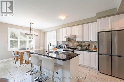 5504 Freshwater Drive, Mississauga, ON - Indoor Photo Showing Kitchen With Stainless Steel Kitchen With Double Sink