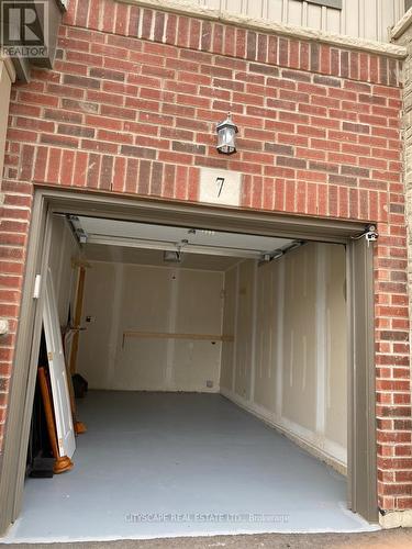 7 - 77 Diana Avenue, Brantford, ON - Indoor Photo Showing Garage