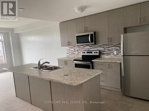 7 - 77 Diana Avenue, Brantford, ON - Indoor Photo Showing Kitchen With Double Sink With Upgraded Kitchen