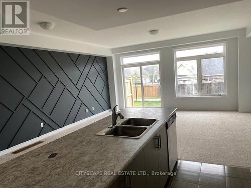 7 - 77 Diana Avenue, Brantford, ON - Indoor Photo Showing Kitchen With Double Sink