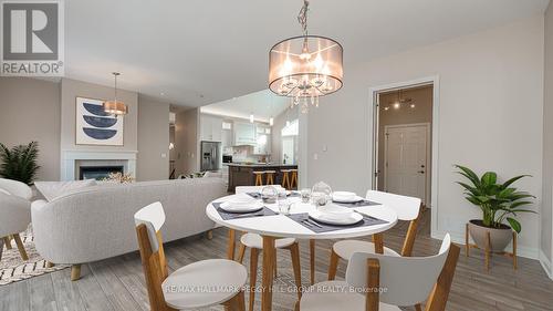 392 Cox Mill Road, Barrie (South Shore), ON - Indoor Photo Showing Dining Room With Fireplace