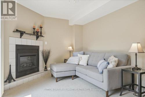 16 - 1540 Reeves Gate, Oakville (Glen Abbey), ON - Indoor Photo Showing Living Room With Fireplace