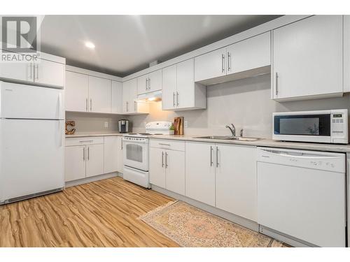 49 Forest Edge Drive, Kelowna, BC - Indoor Photo Showing Kitchen With Double Sink