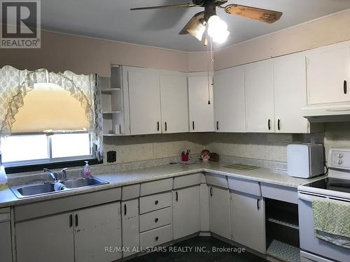 12251 Old Simcoe Road, Scugog, ON - Indoor Photo Showing Kitchen With Double Sink