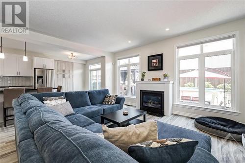 138 Montargis Circle, Ottawa, ON - Indoor Photo Showing Living Room With Fireplace