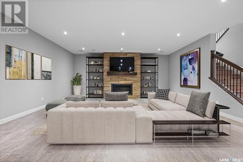 3418 Green Brook Road, Regina, SK - Indoor Photo Showing Living Room With Fireplace