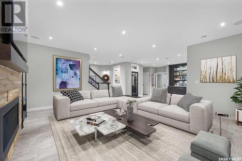 3418 Green Brook Road, Regina, SK - Indoor Photo Showing Living Room With Fireplace