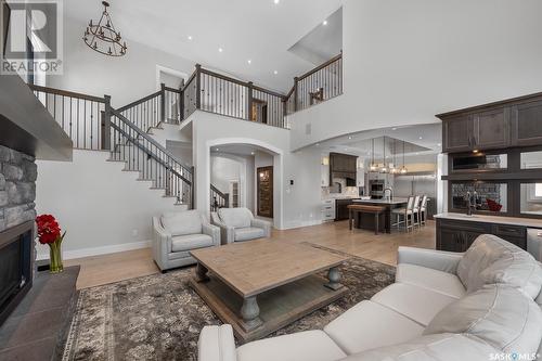 3418 Green Brook Road, Regina, SK - Indoor Photo Showing Living Room With Fireplace