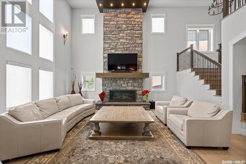 3418 Green Brook Road, Regina, SK - Indoor Photo Showing Living Room With Fireplace