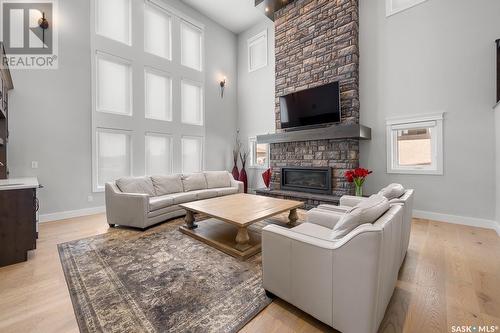 3418 Green Brook Road, Regina, SK - Indoor Photo Showing Living Room With Fireplace