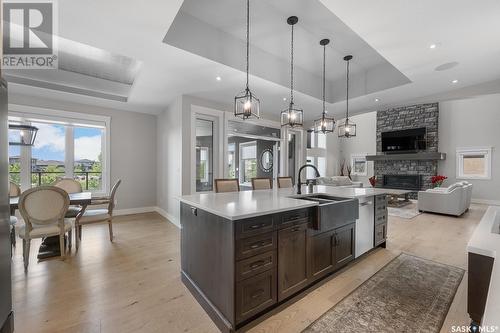 3418 Green Brook Road, Regina, SK - Indoor Photo Showing Kitchen With Fireplace With Upgraded Kitchen