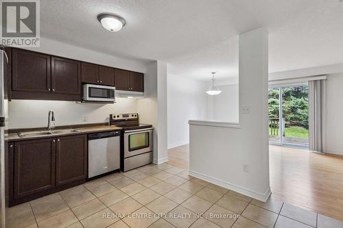 82 - 1059 Whetherfield Street, London, ON - Indoor Photo Showing Kitchen With Double Sink