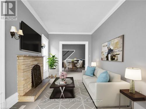 89 Gladstone Avenue, St. Thomas, ON - Indoor Photo Showing Living Room With Fireplace