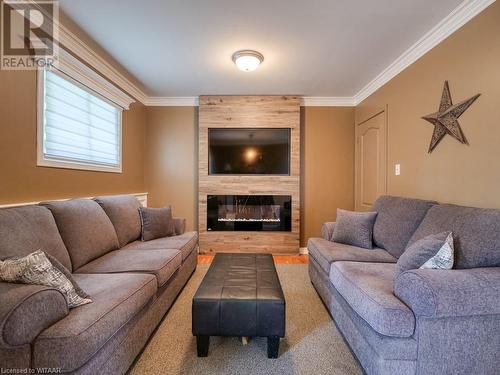 203 Orchard Road, Woodstock, ON - Indoor Photo Showing Living Room With Fireplace