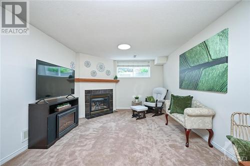 164 Deercroft Avenue, Ottawa, ON - Indoor Photo Showing Living Room With Fireplace