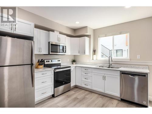 2818 Copper Ridge Drive, West Kelowna, BC - Indoor Photo Showing Kitchen With Double Sink