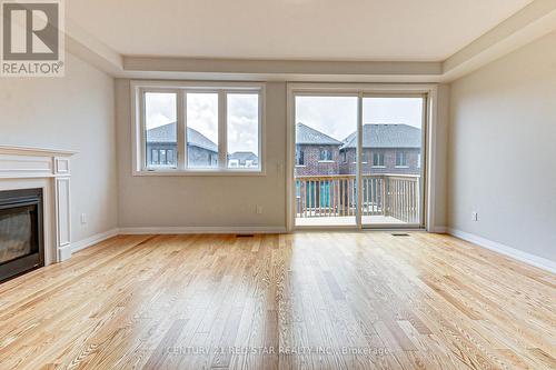 734 Khalsa Drive, Woodstock, ON - Indoor Photo Showing Living Room With Fireplace