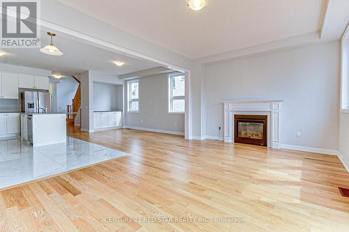 734 Khalsa Drive, Woodstock, ON - Indoor Photo Showing Living Room With Fireplace