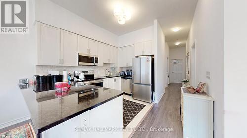 110 - 11611 Yonge Street W, Richmond Hill, ON - Indoor Photo Showing Kitchen With Stainless Steel Kitchen