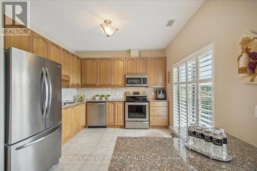 509 - 1499 Nottinghill Gate, Oakville (Glen Abbey), ON - Indoor Photo Showing Kitchen