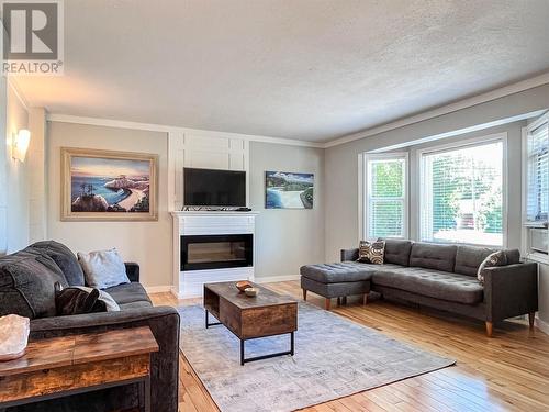 9465 Angus Drive, Coldstream, BC - Indoor Photo Showing Living Room With Fireplace