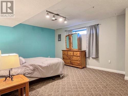 9465 Angus Drive, Coldstream, BC - Indoor Photo Showing Bedroom