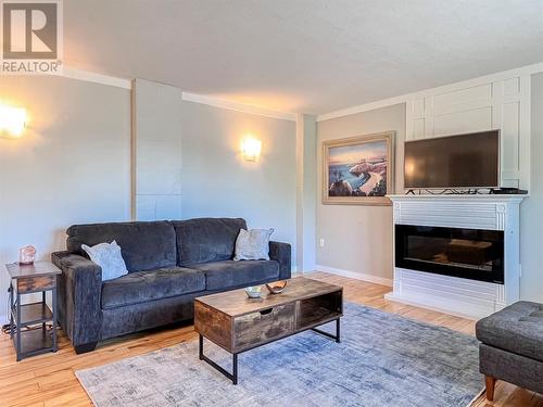 9465 Angus Drive, Coldstream, BC - Indoor Photo Showing Living Room With Fireplace