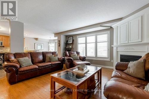 251 Farley Drive, Guelph (Pine Ridge), ON - Indoor Photo Showing Living Room With Fireplace