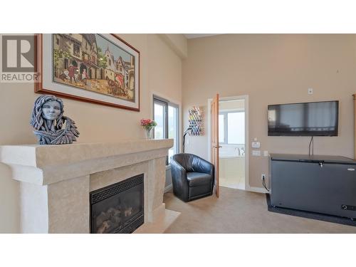 250 Marina Way Unit# 804, Penticton, BC - Indoor Photo Showing Living Room With Fireplace