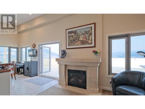 250 Marina Way Unit# 804, Penticton, BC - Indoor Photo Showing Living Room With Fireplace